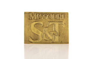 Missouri S&T logo in brass